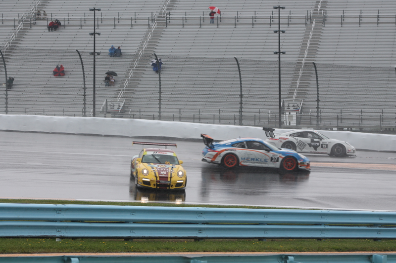 Illustration for article titled Standing Water Causes Mass 911 GT3 Cup Spin-Out At First Turn Of Race